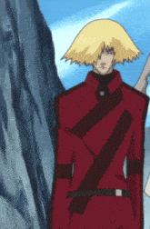 a man with blonde hair is wearing a red jacket and black belt