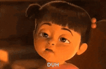 a cartoon girl from the movie monsters inc is making a surprised face .