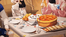 a group of people are sitting at a table with plates and utensils and a cake that says ' congrats '
