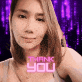 a woman 's face is behind a thank you message