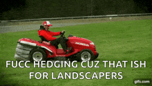 a man is riding a honda lawn mower in a grassy field .