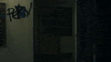 a dark room with graffiti on the wall that says run