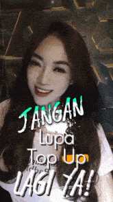 a picture of a woman with the words " jangan lupa top up lagi ya "