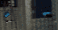 a man with a beard and a white shirt looks down