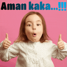 a little girl is giving a thumbs up in front of a pink background that says aman kaka !!!