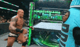 a wrestling match is taking place in front of a wrestlemania sign