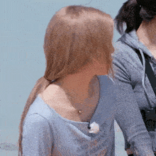a woman is wearing a shirt that says through ups and downs and remain love remains