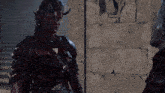 a woman with horns is standing next to a man in a dark room