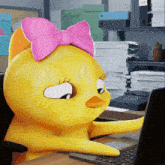 a cartoon duck with a pink bow on her head is using a laptop