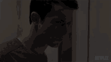 a close up of a man 's face with a netflix logo in the background
