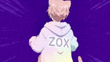 a person wearing a hoodie with the word zox on it
