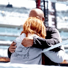 Becky Lynch Triple H GIF - Becky Lynch Triple H Hug GIFs