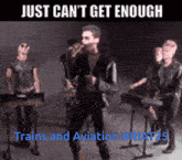 a group of men singing and playing keyboards with the caption " just can 't get enough "