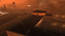 an aerial view of a city with a building that says ' patterson ' on it