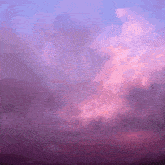 a purple sky with a lot of clouds