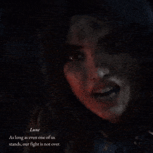 a close up of a woman 's face with a quote that says " lune "