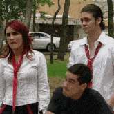 a woman with red hair is making a funny face