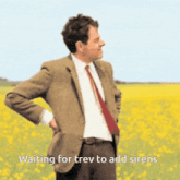 a man in a suit and tie is standing in a field with the words waiting for trev to add sirens