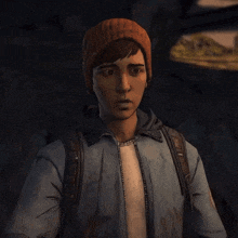 a man wearing a beanie and a blue jacket has a backpack