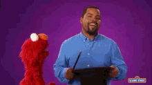 ice cube and sesame street characters elmo and elmer