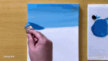 a person is painting a picture of a blue sky