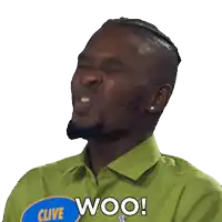 a man in a green shirt with the word woo on it