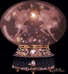 a snow globe with two fairies inside of it and the name j.s. san on the bottom