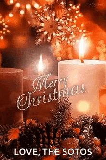 a merry christmas greeting card with candles and pine cones