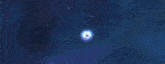 a blue and white robot with a flower on its head is floating in the air on a blue background .