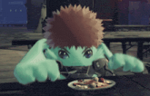 a green cartoon character is sitting at a table with a plate of food
