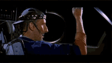 a man in a helmet says sweet jesus in front of a black background
