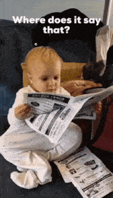 Taking It All In Baby Reading GIF - Taking It All In Baby Reading Where Does It Say That GIFs