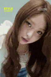 a close up of a woman 's face with the word allure on the bottom