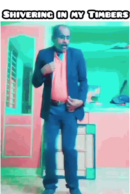 a man in a suit is standing in front of a mirror with the words 