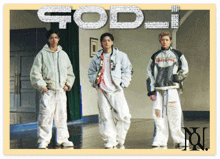 a group of three men standing next to each other with the word god in the background