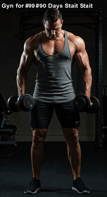 a muscular man is lifting dumbbells in a gym with the words gyn for # 99 # 90 days stait stait above him