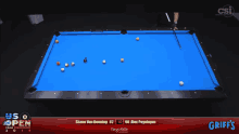 a pool table with a blue cloth sponsored by fargo rate