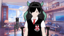 a boy wearing a vest that says saint patrick sits in a chair in front of a microphone