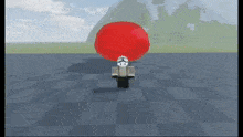a video game character is holding a red balloon on his head .