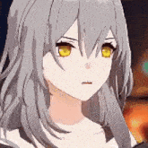 a close up of a girl with gray hair and yellow eyes in a video game .