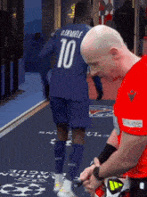a man with the number 10 on his shirt