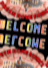 a blurred image of a sign that says " welcome "