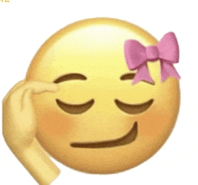 a female emoji with a pink bow on her head