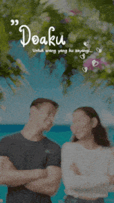 a man and a woman are standing next to each other with the words doaku written on the bottom