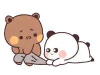 a brown bear and a white panda bear are laying on the ground