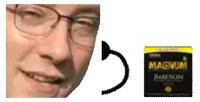a close up of a man 's face next to a magnum baby skin condom