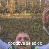 a man wearing a yellow vest and tie is saying goodbye salad go