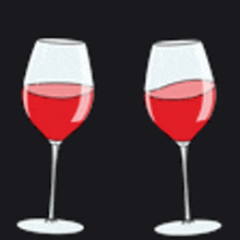 two wine glasses with red liquid in them on a black background