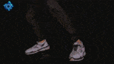 a person is doing a handstand in a dark room
