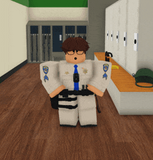 a man in a sheriff 's uniform is standing in a hallway